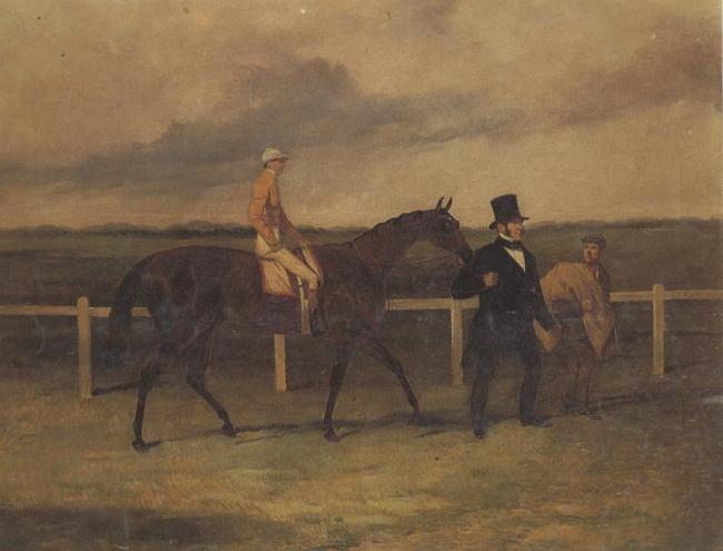  Mr J B Morris Leading his Racehorse 'Hungerford' with Jockey up and a Groom On a Racetrack